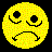 Six yellow pixelated sad face icons arranged in two of three on a black background, each with distinct mouth shapes and eye positions