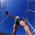 Static 50x50 pixel icon showing a stylized figure in mid-throw against blue background with motion blur effects.