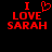 Red pixelated text on black background reads "I ❤️ LOVE SARAH" with heart symbol replacing 'love' in first frame, then replaced by second 'I' in subsequent frames.