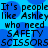 Pixelated text on a blue background repeats phrases about people needing safety scissors, with visible pixelation and color blending.