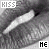 A grayscale animated icon shows a white cylindrical object against a textured background with 'KISS' text at top and 'HE' text at bottom.