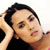 Static 50x50 pixel buddy icon showing a close-up of a person with dark hair and light skin, wearing a black top against a white background.