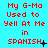Red pixelated text on cyan background reads 'My G-Ma Used to Yell At Me in SPANISH' with varying punctuation and symbols across repeated instances.