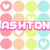 A static image with a repeating pattern of pastel-colored circles in pink, orange, green, and cyan, each containing a white heart symbol, overlaid with the name "ASHTON" in pink pixelated text.