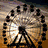 Animated sequence showing a Ferris wheel with black lettering on its cars, transitioning to a heart-shaped 'love' text, then a peace symbol, and finally two people forming a heart shape.