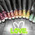 Pixelated image with blurred background showing a figure in pink and brown tones, white heart symbol, and green 'LOVE' text on gray surface.