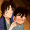 Two anime-style characters in traditional Japanese clothing, one with dark hair and glasses blushing while the other leans close.