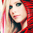 A pixelated image of a person with blonde hair and red clothing, showing subtle facial expression changes across frames.