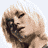 A 48x48 pixel animated contact sheet showing a woman with blonde hair in a dark low-cut dress across three sequential frames, displaying subtle pose and expression changes from left to right.