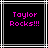 Black background with white and gray lines, pink pixelated text reading "Taylor Rocks!!!" in two