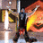 A pixelated animated icon shows a figure in black pants and yellow shoes seated at a table with red-and-orange flames, transitioning from static to motion.