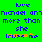 Green background with blue pixelated text reading "i love michael ann more than she loves me" and orange star-like symbols.