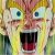 Pixelated close-up of a face with wide eyes, open mouth, and raised hands against a blurred background.