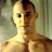 Static pixelated image of a shirtless male figure with short dark hair against a muted background, rendered in low-resolution 256x256 pixels.