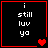Four identical black square with red borders display white text 'i still luv ya' and pixelated heart symbols changing from single to double to split to faded
