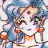 Pixelated static image of a character with light brown hair, dark eyes, and a neutral expression, wearing a blue top with orange accents against a light background.