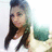 A person with long dark hair and a white top appears in a of four , with the rightmost missing