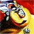 Pixelated cartoon character with large eyes and a wide smile, wearing a red cap and dark clothing against a bright yellow background.
