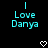 Cyan pixelated text 'I Love Danya' with a white pixelated heart symbol on a black background.