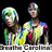 Two pixelated figures with multicolored hair and clothing stand side-by-side against a black background, one holding an object.