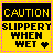 Two identical yellow caution signs with black text and pink borders, differing only in heart color between frames.