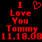 Red pixelated text on black background reads 'I Love You Tommy 11.18.08' with a heart symbol replacing 'Love' in the first instance.