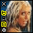 Pixelated image of a person with light curly hair, showing two side-by-side views where the left view has black and yellow symbols on the left edge while the right view replaces those symbols with white and yellow ones.