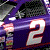 Animated sequence of a purple race car with white number 2, showing motion blur and speed lines across frames.