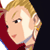 Pixelated cartoon-style icon of a character with blonde hair and red clothing, cropped to show upper body against dark background.
