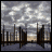 Pixelated animation of a cityscape background with text changing across frames to form the phrase "my world will never be as perfect as this".