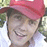 A person wearing a red cap and white shirt appears in four distinct poses across the image