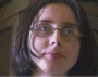 Two side-by-side static images of a person with dark hair, one showing a front-facing view with glasses and the other a profile view with hand near head.