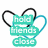 Animated icon with interlocking black and blue heart outlines surrounding green text blocks reading 'hold friends close' on left, 'to your heart' on top right, and 'and never let go.' below.