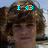 A pixelated image of a person with curly brown hair, showing two states: one with cyan text 'I <3' and another with cyan text 'RYAN!'