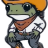 Pixelated green frog wearing orange hard hat, brown bandana, white shirt, and dark pants with green patches, standing with arms crossed against gray background.