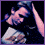A pixelated image of a person with dark hair holding an object, transitioning to a close-up face view and then displaying text over the background.