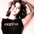 Pixelated image of a person with shoulder-length brown hair wearing a black sleeveless top, holding a black rectangular object with white text.