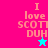 Pixelated text "I love SCOTT DUH" on split background with cyan star changing from blue to pink, animated.