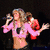 A six- shows a woman in various poses wearing pink and dark blue outfits with white socks, holding a microphone
