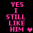 Pixelated pink text on black background reads "YES I STILL LIKE HIM" with a small heart symbol, displayed in two vertical