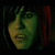 Pixelated image of a green-skinned character with dark hair and red clothing against black background, next to text reading 'so extremely hot!!!!'