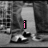 A black-and-white animated image of a cartoon character with pink text changing across four