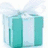 Animated turquoise gift box with white ribbon and bow, transitioning to blue patterned background with white dots and black vertical bar, then to glowing blue heart with 'Love' text, finally to solid blue background with 'Blue' text.