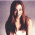 A split-frame contact sheet showing a pixelated image of a woman with long brown hair on the left and green text reading "Original Icons .com" on a dark green background on the right.