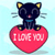 Pixelated black cat with yellow inner ears sits atop a red heart-shaped object with 'I LOVE YOU' text on it against a light blue background.