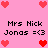 Pixelated pink background with red heart icons and repeated text "Mrs Nick Jonas =<3" in black pixel font.