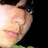 Pixelated close-up of a person's face on left with red text 'I LOVE SAM ADAMS!!! <3' on black background.