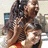 A pixelated image of two people embracing, with text overlays reading 'AERIELL LOVES PIGGY' and 'BACC RIDES HAHA' on black backgrounds.