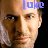 Pixelated close-up of a person's face with blue text overlay, displayed as a static AIM buddy icon.