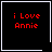 Four black square with white borders display red text 'i Love Annie' and one has a white heart symbol, another a white starburst symbol